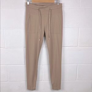 Travis Mathew women’s beyond the coast ponte pant in natural size M NWT